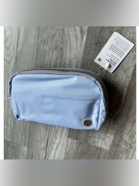 NWT Lululemon belt bag baby blue and gold